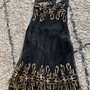 Beautiful gold & black midi dress, depending on your height..